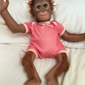 Adorable Orangutan Doll in Pink Outfit